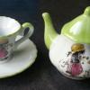 Tasse et théière verte